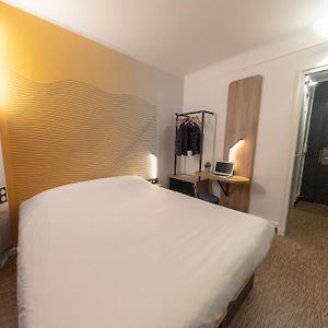Familie Kamer met een King Size Bed